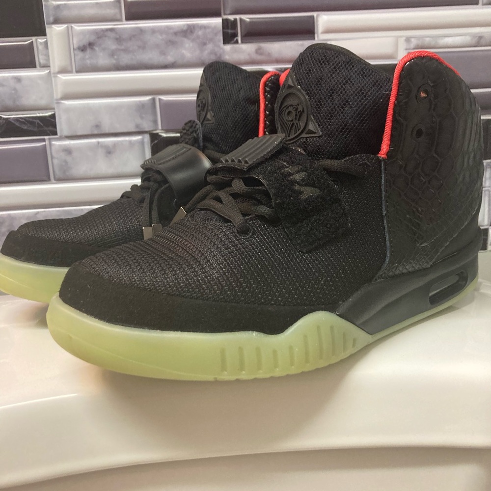 Nike Yeezy 2. Clean but a half size too small.